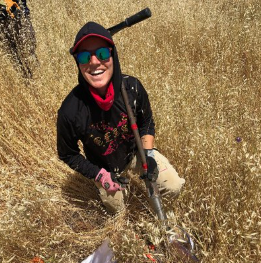 Scientist collecting soil sample